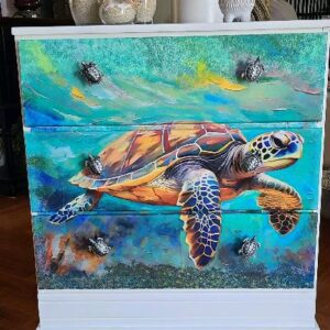 A painting of a turtle on the side of a dresser.